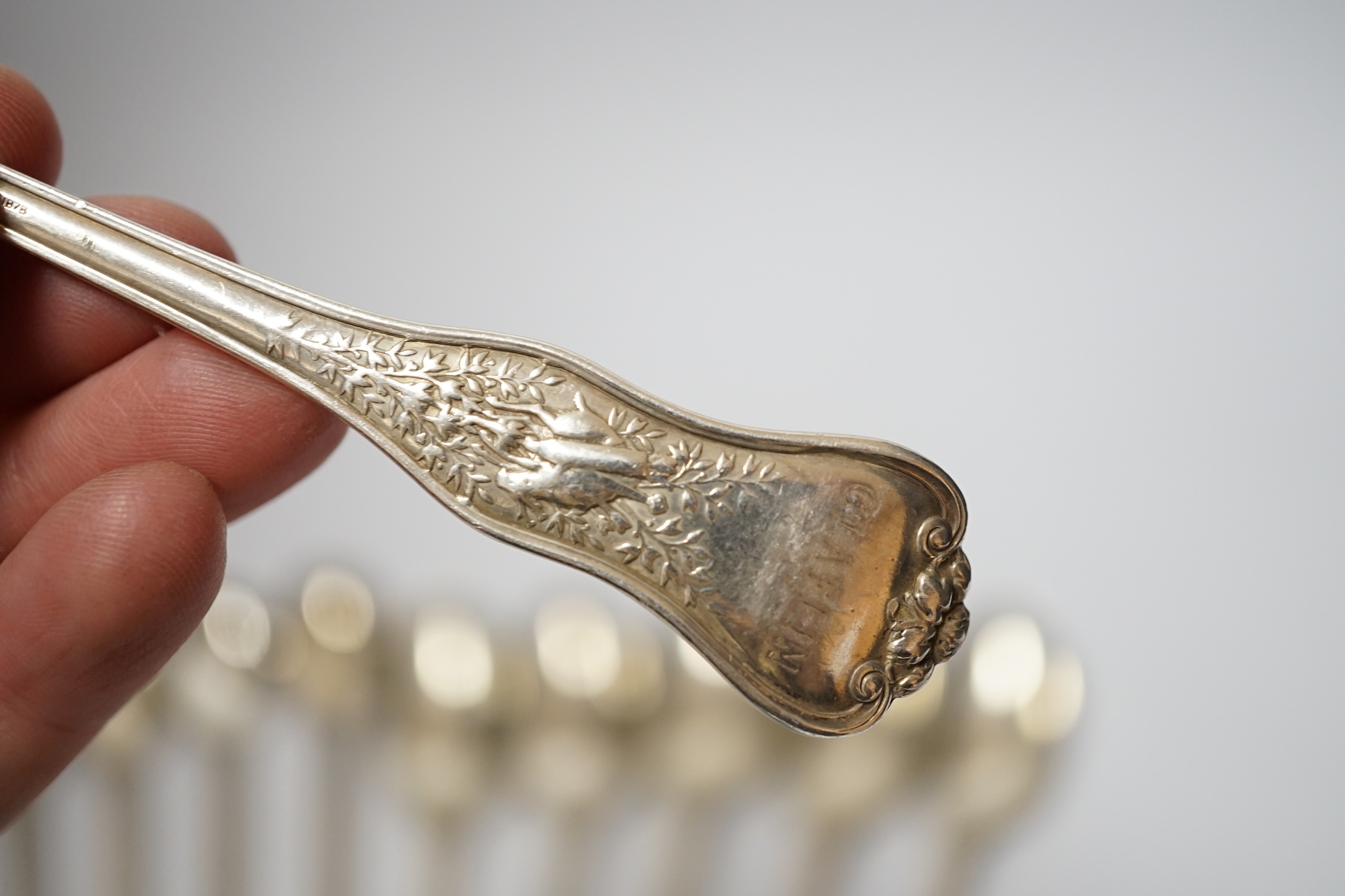 A set of six late 19th/early 20th century Tiffany & Co sterling teaspoons and five similar ice cream spoons, latter 18.7cm, 15.8oz.